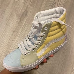 Multicolored high top pastel vans